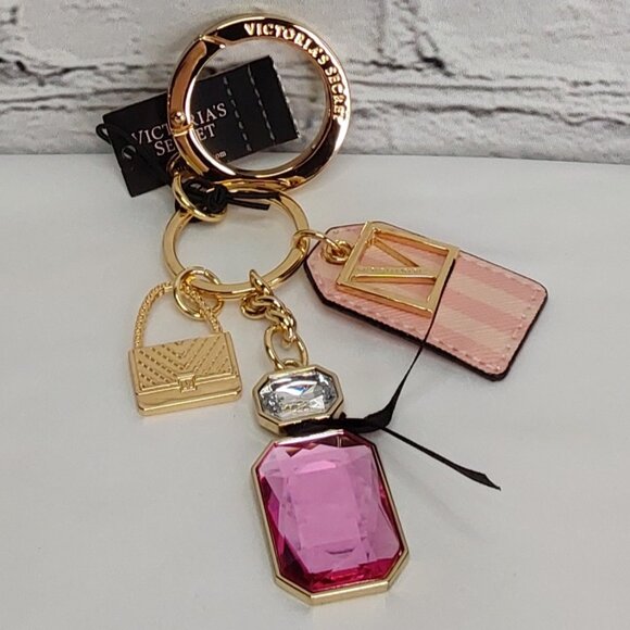 VICTORIA'S SECRET 'BOMBSHELL' SIGNATURE CHARMS PARFUM KEYCHAIN - Picture 2 of 16